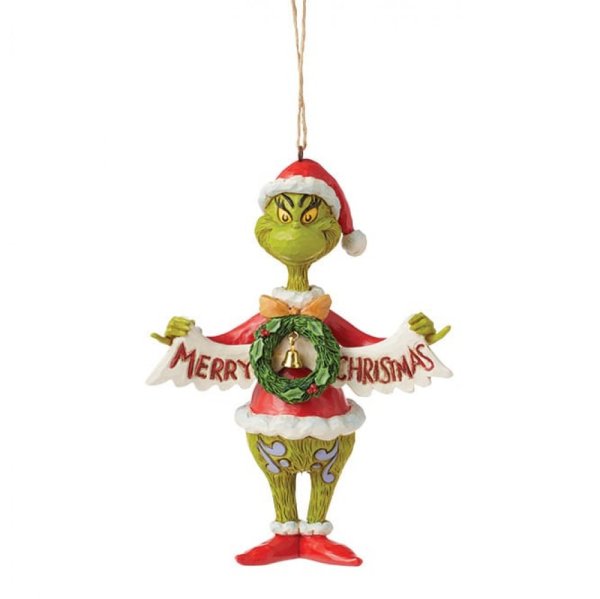 Il Grinch con l'ornamento appeso dello striscione di Natale